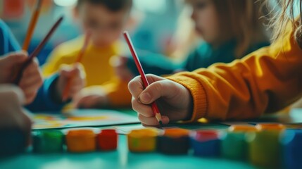 Children engaged in creative activities using colored pencils and paints.