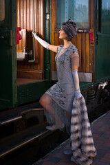 1920s woman on night train