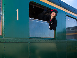 1920s woman in vintage train