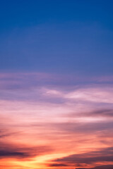 Sunset Sky Background,Sunrise with Yellow,Pink,Orange, Blue Sky,Nature Landscape Dramtic Golden Hour with twilight Sky in Evening after Sun Dawn,Vertical Banner Sunlight for Four Seasons concept