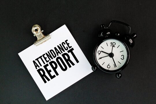 white paper with the words attendance report. formal document that records the presence or absence of individuals at a specific event, meeting, or period, typically used in educational, corporate