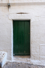 Old authentic vintage closed front door in Ostuni, Puglia, Italy