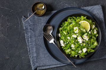 Classic Greek green lettuce salad with feta cheese