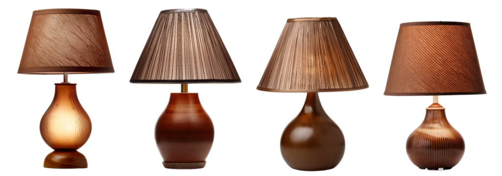 Four stylish table lamps with various shades on a white isolated background