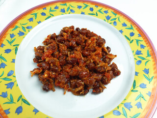 Sambal balado teri kacang is fried anchovy and peanuts with hot and spicy chili sauce. An Indonesian traditional food