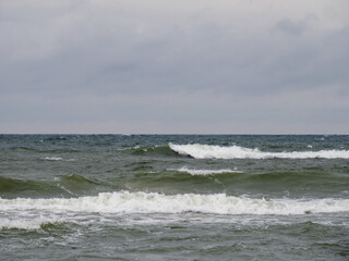 Calming Seascape with Waves Under a Cloudy Sky