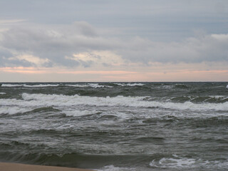 Serene Morning by the Ocean with Cloudy Sky and Gentle Waves