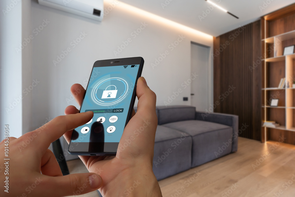 Poster young woman holding smart phone with launched security application at home. concept of controlling a