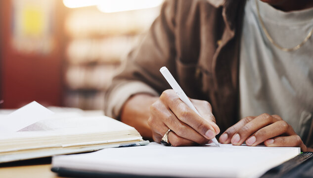 Hands, writing and books with person in library for knowledge, education and college thesis. Academy, future and university with student and studying on campus for exam, project and scholarship
