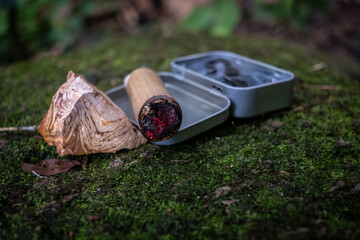 Survival gear flint and steel fire in vintage use