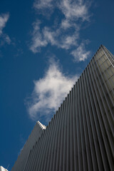 Blue sky, white clouds and sunny weather at Karlowicz Philharmonic< Szczecin, Poland