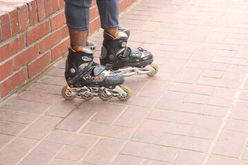 Inline Skates with leg on road