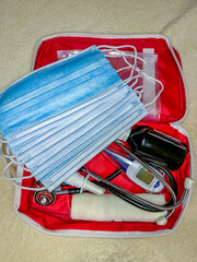 comprehensive medical kit featuring masks and essential tools