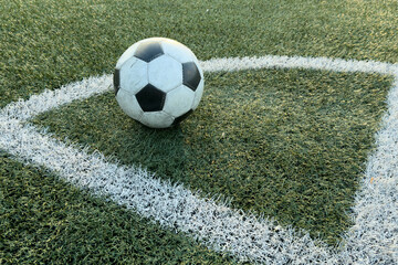 soccer Football on Corner kick line of ball and a soccer field , football field , background texture