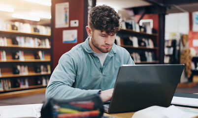 Learning, laptop and research with man in library for knowledge, education and college thesis....