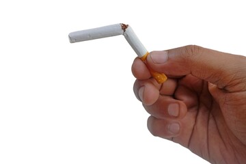 Stop smoking, quit smoking or no smoking cigarettes. Woman holding broken cigarette in hands. Woman refusing cigarettes and lung health concept.