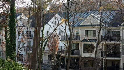 Obraz premium The beautiful little town landscape with the colorful autumn leaves and old buildings in USA 