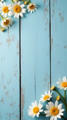 Fototapeta premium Collection of White and Yellow Daisies With Various Sizes Scattered Across a Rustic Blue Wooden Background