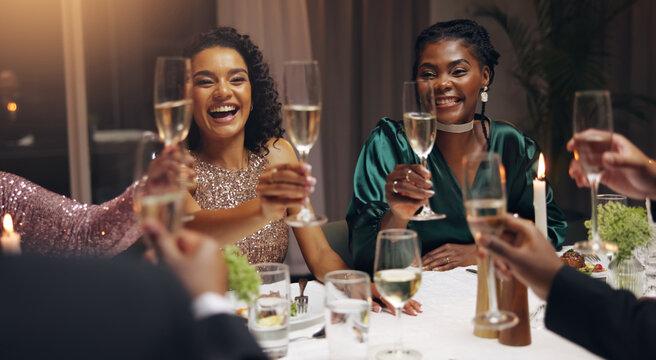 Business people, dinner and toast champagne at night in celebration, goal or diversity for success with smile at party. Team, drinks and alcohol for cheers, congratulations and new year at gala event