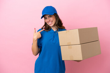 Delivery Italian woman isolated on pink background giving a thumbs up gesture