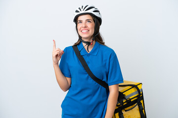 Young delivery woman with thermal backpack isolated on white background pointing up and surprised