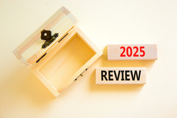 Planning 2025 review new year symbol. Concept words 2025 Review on beautiful wooden blocks. Beautiful white background. Wooden empty chest. Business 2025 review new year concept. Copy space.