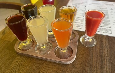 Set of tinctures and liqueurs with different flavors.