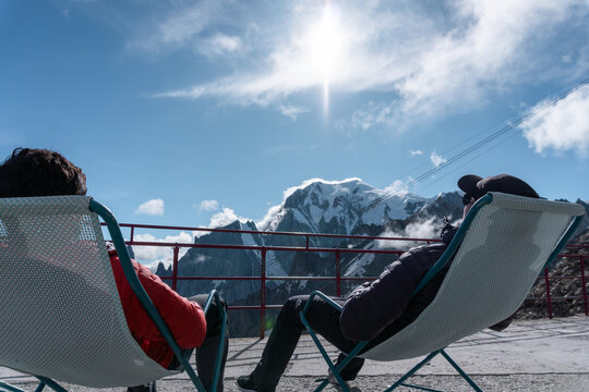Mont Blanc sunset. people watching on deck chairs, snow, mountains, climbing, landscapes, tourist, holiday, France, Italy, Switzerland, Torino, Chamonix