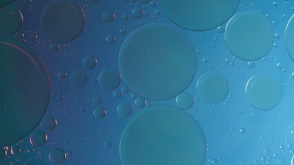 nice background, abstract background of oil bubbles on water with blue light