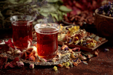 Herbal tea and a mix of various dried medicinal plants and herbs.