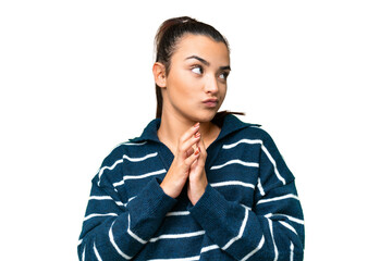 Young beauty woman over isolated chroma key background scheming something