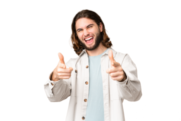 Young handsome man over isolated chroma key background pointing to the front and smiling