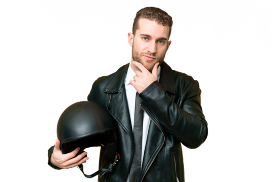 Business man with a motorcycle helmet over isolated chroma key background thinking