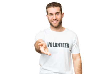 Young volunteer man over isolated chroma key background shaking hands for closing a good deal
