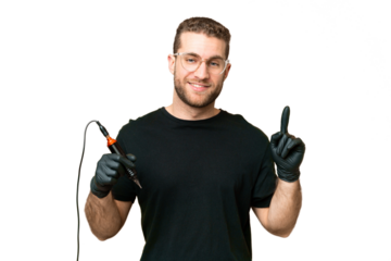 Tattoo artist man over isolated chroma key background pointing up a great idea