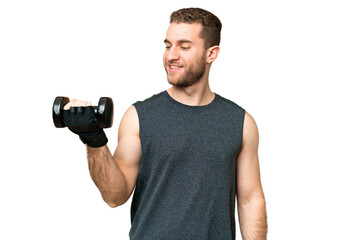 Young sport man making weightlifting over isolated chroma key background with happy expression