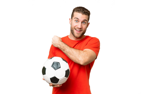 Handsome young football player man over isolated chroma key background celebrating a victory