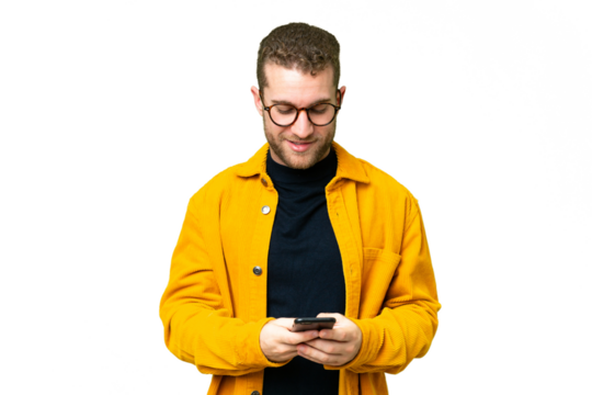 Young handsome blonde man over isolated chroma key background sending a message with the mobile