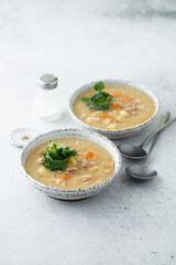 Homemade pea soup with smoked meat