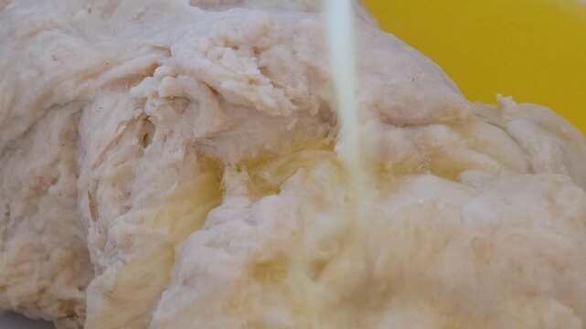 Making Pie Dough at Home. Butter is added to the dough
