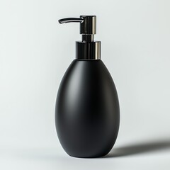 Obraz premium Elegant black pump bottle on a white isolated background.