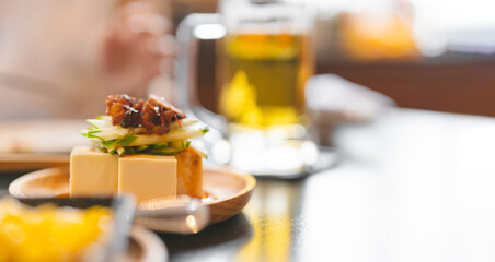 Tofu with sesame oil and chilli chinese appetizer style menu