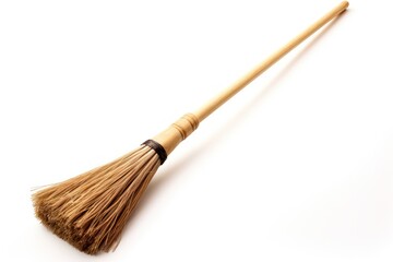 traditional broom on a white background Showing a long stem thick sweeping brush and a convenient handle