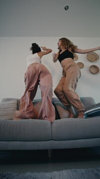 Playful Moments Friends Enjoying Fun Times Together in Their Stylishly Cool Outfits