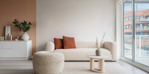 Cozy and modern living room featuring a beige sofa with orange cushions in a bright apartment