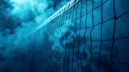 Mysterious blue fog envelops volleyball net in a dimly lit indoor arena during evening practice