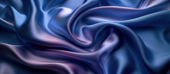 Obraz premium Elegant flowing fabric texture with smooth silky waves and swirls in a dramatic gradient of deep blue and purple hues Luxurious glamorous and visually captivating abstract background