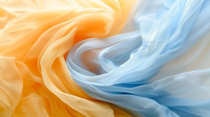 Obraz premium Abstract background featuring flowing blue and yellow silk fabric waves for creative banners