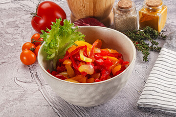 Diced raw bell red and yellow pepper