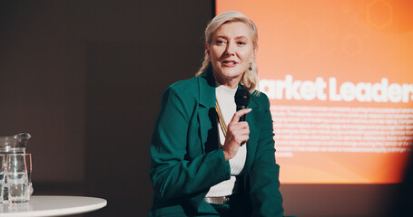 Mature woman, stage and leadership seminar for information, knowledge and public speaking. Female...